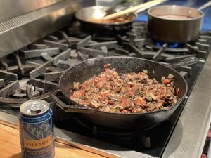 Mushrooms and onions sauteeing