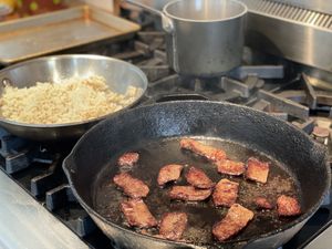 Beef with fried rice in the background