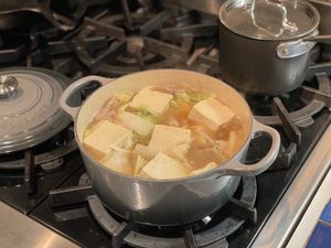 Tofu simmering in soup