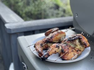 Chicken next to the BBQ