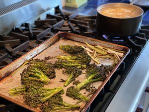 Brocolli and green garlic on a sheet pan