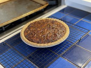Pony pie resting on a rack