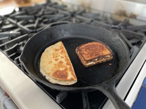 Two forms of cheese + bread in a single pan