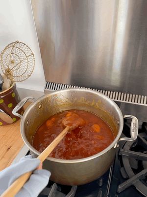Apricot jam cooking in a pot