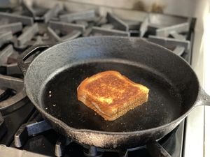 grilled cheese in a cast iron skillet