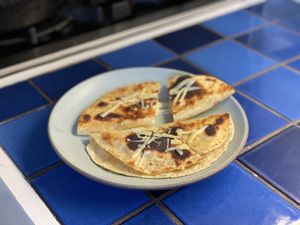 Two quesadillas on a plate