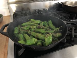 Peppers cooking in a pan