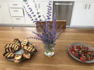 Lavender, grilled bread, and tomato slices 