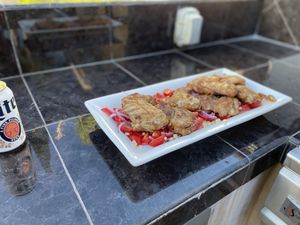 Chicken on corn & tomatoes