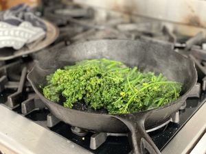 Brocollini in a pan